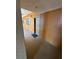 A long hallway showing the doors to units at 12527 Floridays Resort Dr # 506-E, Orlando, FL 32821
