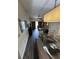 Open-concept living and dining area with plenty of natural light and modern furnishings at 12527 Floridays Resort Dr # 506-E, Orlando, FL 32821