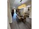 Bright living and dining area with stylish décor and an open layout at 12527 Floridays Resort Dr # 506-E, Orlando, FL 32821