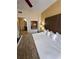 Main bedroom features plush bedding and convenient access to the ensuite bathroom at 12527 Floridays Resort Dr # 506-E, Orlando, FL 32821