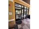 Palm Cafe storefront features exterior signage and windows into the store at 12527 Floridays Resort Dr # 506-E, Orlando, FL 32821