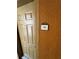 Close-up of a unit door with the unit number and textured wall at 12527 Floridays Resort Dr # 506-E, Orlando, FL 32821