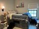 Bedroom showcasing a unique platform bed with built-in storage drawers at 1266 Spotted Sandpiper Loop, Winter Springs, FL 32708