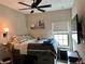 Bedroom showcasing a unique platform bed with built-in storage drawers at 1266 Spotted Sandpiper Loop, Winter Springs, FL 32708