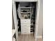 Organized closet featuring built-in shelving and drawers for optimal storage at 1266 Spotted Sandpiper Loop, Winter Springs, FL 32708