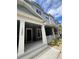 Charming townhome exterior with a welcoming front porch and well-maintained landscaping at 1266 Spotted Sandpiper Loop, Winter Springs, FL 32708