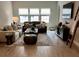 Comfortable living room with ample seating, natural light, and stylish decor at 1266 Spotted Sandpiper Loop, Winter Springs, FL 32708