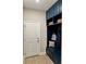 Mudroom features a built-in bench, storage cubbies, and hooks for coats and bags at 1266 Spotted Sandpiper Loop, Winter Springs, FL 32708