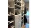 Well-organized walk-in closet with shelving, drawers, and hanging space at 1266 Spotted Sandpiper Loop, Winter Springs, FL 32708