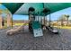Playground with climbing wall, slides, and stairs for to enjoy outdoor activities at 1323 Berry Ln, Davenport, FL 33837