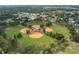Aerial view highlighting the proximity to baseball and soccer fields in the area at 1341 W Belmar St, Lakeland, FL 33815