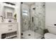 Bathroom showcasing a glass-enclosed shower with marble tiling and a modern vanity at 1341 W Belmar St, Lakeland, FL 33815