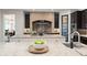 Bright kitchen featuring granite countertops, stainless appliances, and stylish design at 1455 Kelso Blvd, Windermere, FL 34786