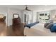 Serene main bedroom with hardwood floors, sitting area, and views of the water at 1455 Kelso Blvd, Windermere, FL 34786
