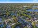 A scenic neighborhood with a sparkling lake in the background at 146 Tollgate Trl, Longwood, FL 32750
