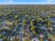 An elevated neighborhood view features mature trees and winding roads at 146 Tollgate Trl, Longwood, FL 32750