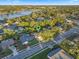 Drone shot of neighborhood near lake at 146 Tollgate Trl, Longwood, FL 32750
