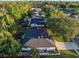 Aerial view highlighting the home's location, roof condition, landscaping, and proximity to surrounding neighborhood at 146 Tollgate Trl, Longwood, FL 32750