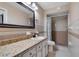 Bathroom with a granite countertop vanity, shower, and classic neutral tones at 146 Tollgate Trl, Longwood, FL 32750
