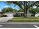 Charming one-story home with a lush front lawn and mature trees offering ample shade at 146 Tollgate Trl, Longwood, FL 32750