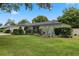 Charming home with a well-manicured front yard and beautiful, mature landscaping at 146 Tollgate Trl, Longwood, FL 32750