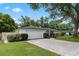 Charming single story home featuring a large garage, brick lined driveway, and well-manicured landscaping at 146 Tollgate Trl, Longwood, FL 32750