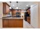 Updated kitchen featuring granite countertops, stainless steel appliances, and beautiful wood cabinetry at 146 Tollgate Trl, Longwood, FL 32750