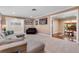 Comfortable living room featuring neutral paint, carpet, with tv and sectional couch at 146 Tollgate Trl, Longwood, FL 32750