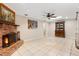 Large living area with brick fireplace and skylight at 146 Tollgate Trl, Longwood, FL 32750