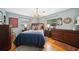 Cozy bedroom with a comfortable bed, hardwood floors, and natural light at 1516 Arthur St, Orlando, FL 32804