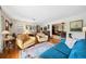 Comfortable living room featuring hardwood floors, stylish furnishings, and a welcoming atmosphere at 1516 Arthur St, Orlando, FL 32804
