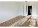 Comfortable bedroom with wood flooring, providing a tranquil and inviting space, perfect for relaxation at 15637 Carina Dr, Orlando, FL 32828