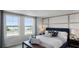 The bedroom offers coordinated decor and plenty of natural light at 16341 Lakelet Aly, Winter Garden, FL 34787