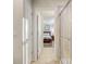 Bathroom with tile shower and view into the bedroom at 2186 Tripoli Ct, Kissimmee, FL 34747