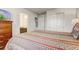 Comfortable bedroom with view into ensuite bathroom and closet at 2186 Tripoli Ct, Kissimmee, FL 34747