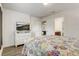 Comfortable bedroom with a TV, dresser, closet and ensuite bathroom at 2186 Tripoli Ct, Kissimmee, FL 34747