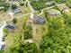 Aerial view of a property and neighborhood with green trees at 2245 Bronco Dr., St Cloud, FL 34771