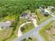 Aerial view of large home with long driveway in wooded area at 2245 Bronco Dr., St Cloud, FL 34771