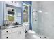 Stylish bathroom with a marble vanity, shower, and plenty of natural light at 2245 Bronco Dr., St Cloud, FL 34771