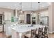 Well-appointed kitchen showcases double islands, stainless steel appliances, and plenty of cabinet space at 2245 Bronco Dr., St Cloud, FL 34771