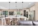 Bright, airy kitchen boasts a large center island with pendant lighting and stainless steel appliances at 2245 Bronco Dr., St Cloud, FL 34771