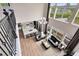 Spacious living room with soaring ceilings, large windows, and modern decor at 2245 Bronco Dr., St Cloud, FL 34771
