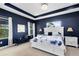 Modern bedroom features accent wall and large windows for natural light at 2245 Bronco Dr., St Cloud, FL 34771