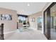 A second-story office space with natural light, neutral walls, and an open doorway to the adjacent bedroom at 2245 Bronco Dr., St Cloud, FL 34771