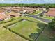 Community dog park offers a secure, fenced space for pets to exercise and socialize with lush landscaping at 2586 Lancaster Ridge, Davenport, FL 33837