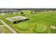 Scenic golf course featuring lush green fairways, mature trees, and well-maintained sand traps in a golf community at 2586 Lancaster Ridge, Davenport, FL 33837