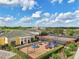 Bright and colorful community playground and tennis courts offer recreation and outdoor activities for residents at 2586 Lancaster Ridge, Davenport, FL 33837