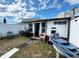 Cozy backyard featuring a barbecue grill and space for outdoor entertaining at 2716 Upsandown St, Orlando, FL 32837