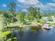 Overhead lake view featuring a private dock, gazebo and lakefront lawn and landscaping at 277 Sunrise Pt, Lake Mary, FL 32746