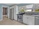 This kitchen features stainless steel appliances and a modern backsplash at 277 Sunrise Pt, Lake Mary, FL 32746